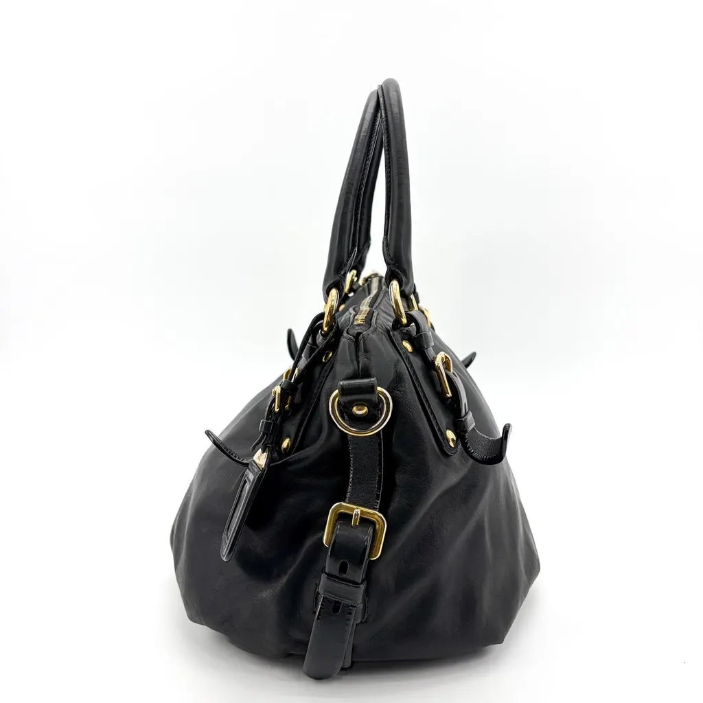 Prada Vitello Phoenix Black Gold Buckle Top Handle Bag Black Leather Good - Model View