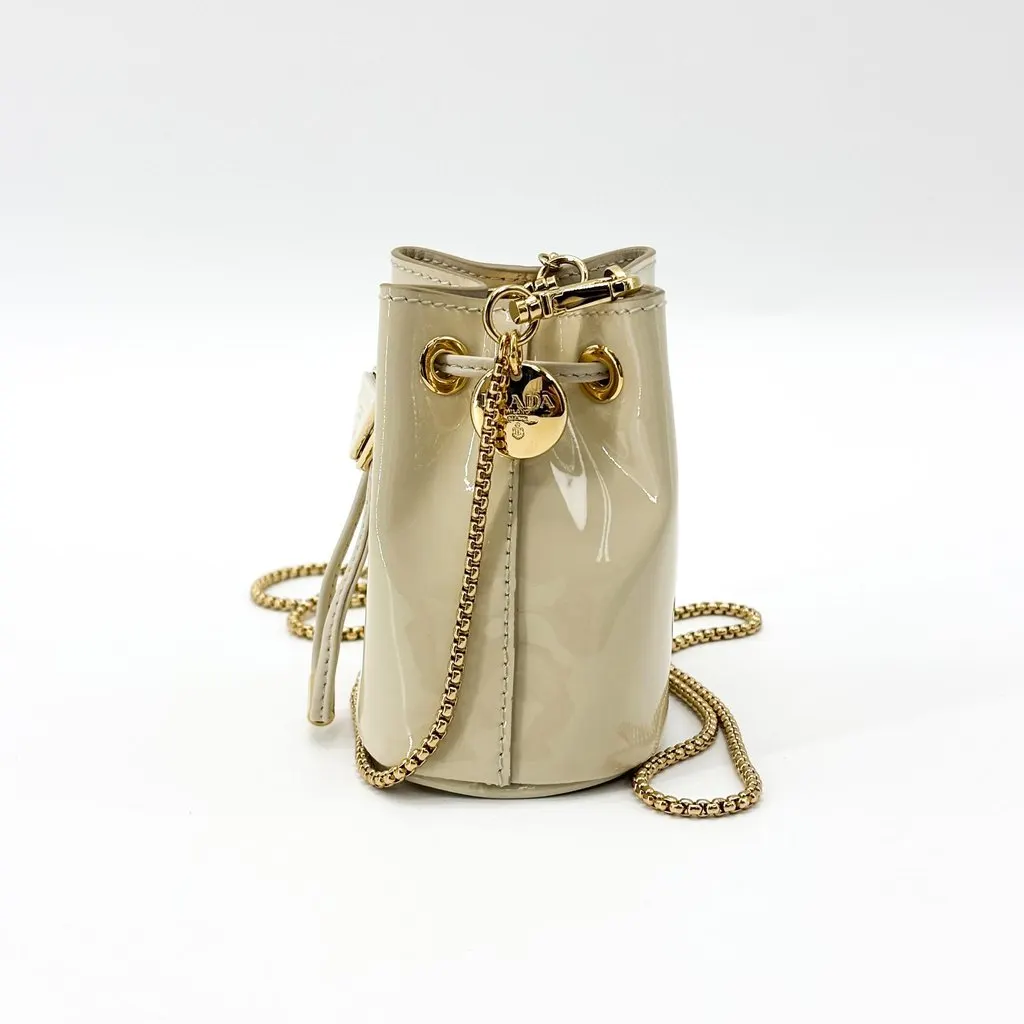 Prada Patent Leather Micro Bucket Bag Beige Gold Hardware Beige Leather Very good - Model View