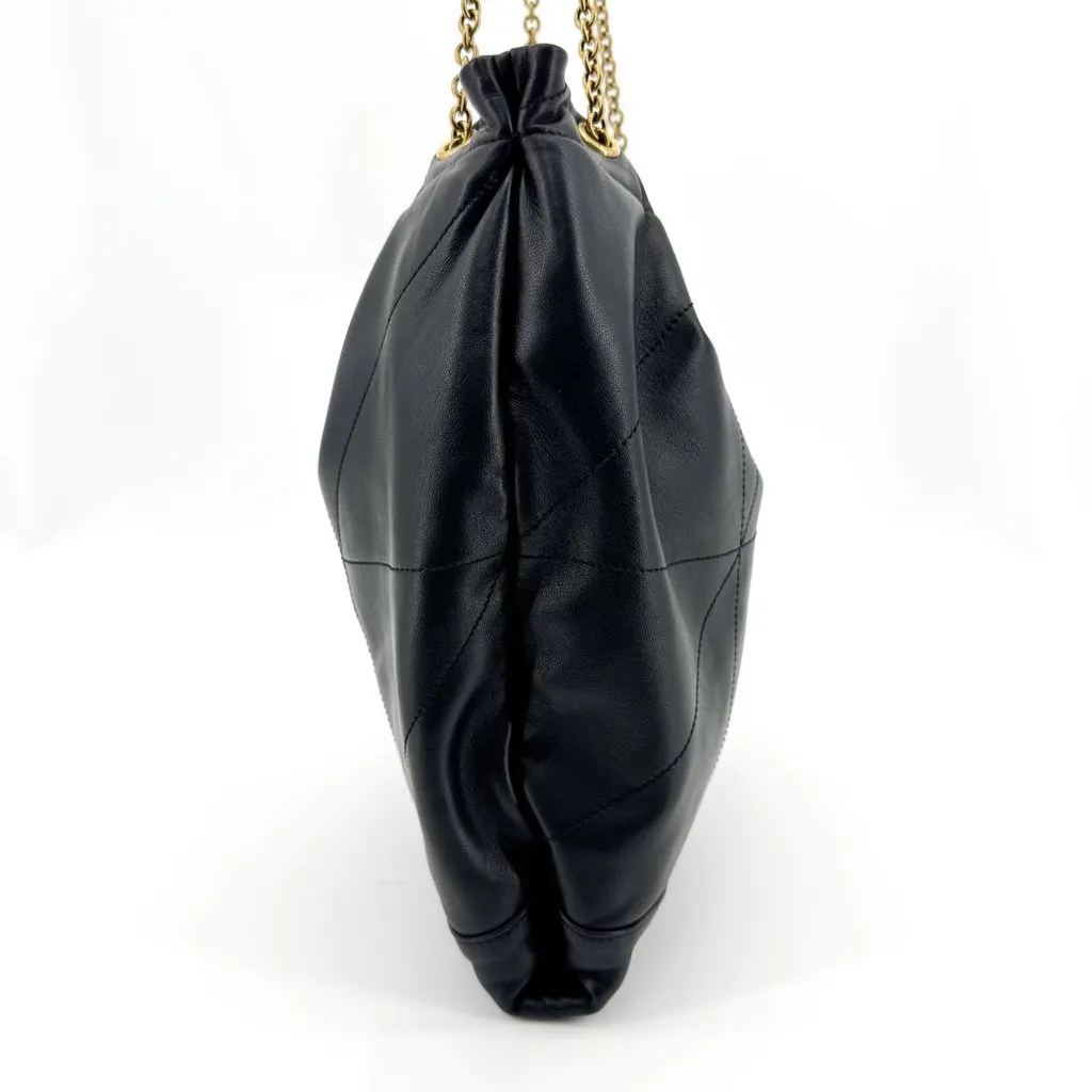 Saint Laurent June Drawstring Bag in Quilted Lambskin Black Gold Black Leather Very good - Model View