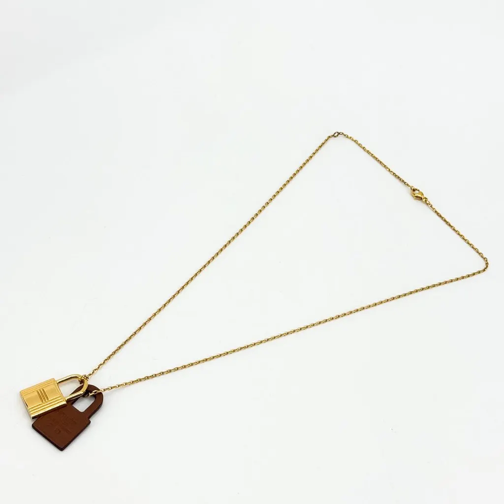Hermès O'Kelly Pendant Necklace Gold Leather GHW Brown Good - Box View