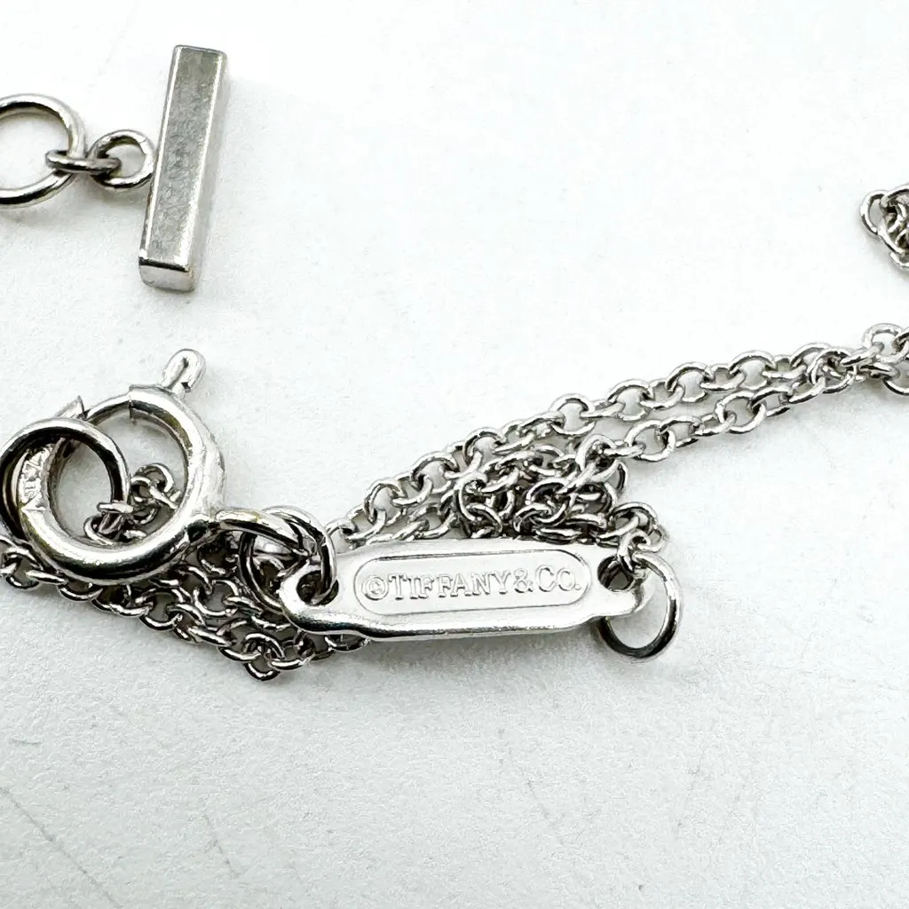 Tiffany & Co . T Smile Pendant Mini 18K White Gold with Diamonds Silver Very good - Model View