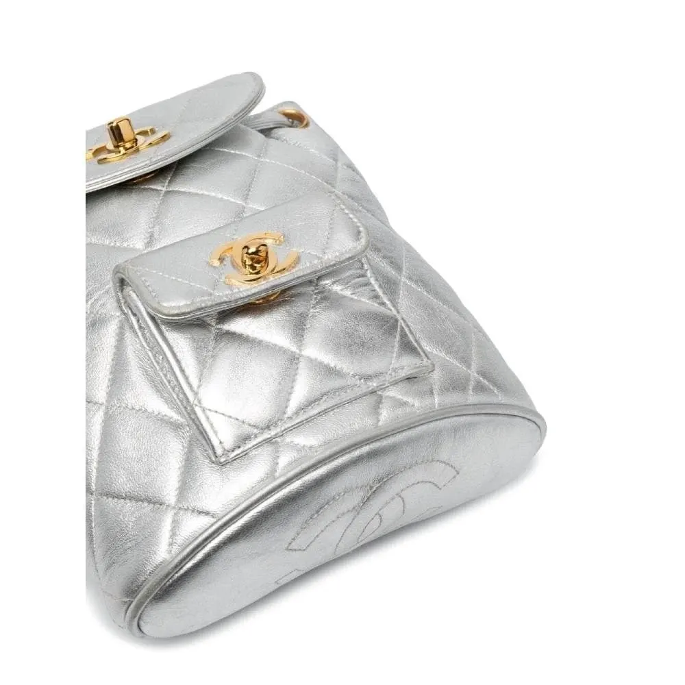 Chanel Silver Quilted Leather Backpack - '90s Silver Leather Good - Model View
