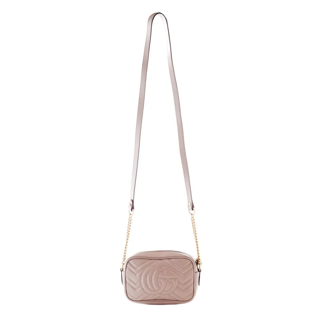 Gucci Mini GG Marmont Matelasse Leather Crossbody Bag - '20s Gold Leather Good - Model View