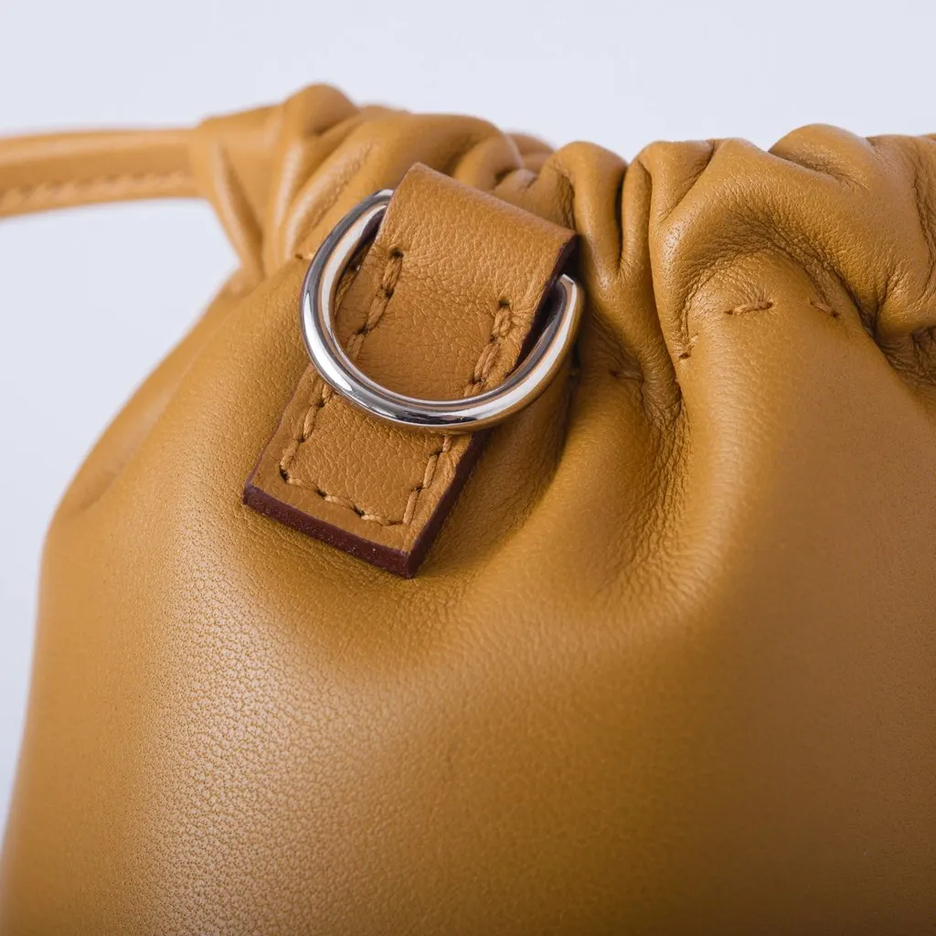 Hermès Pilo Phone Case in Milo Lambskin Red Leather Good - Model View
