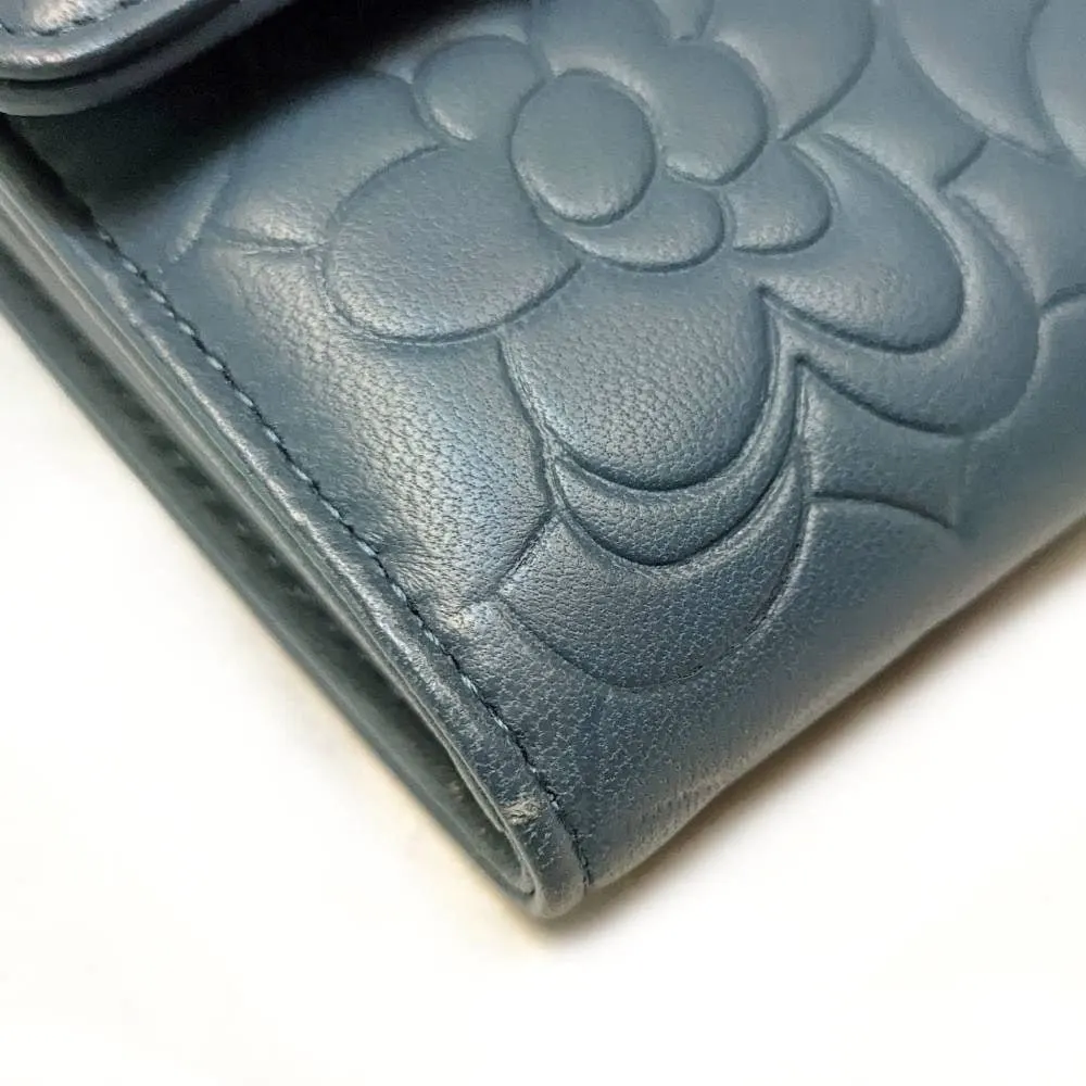 Chanel Powder Blue Embossed Wallet - 2010s Blue Leather Good - Model View