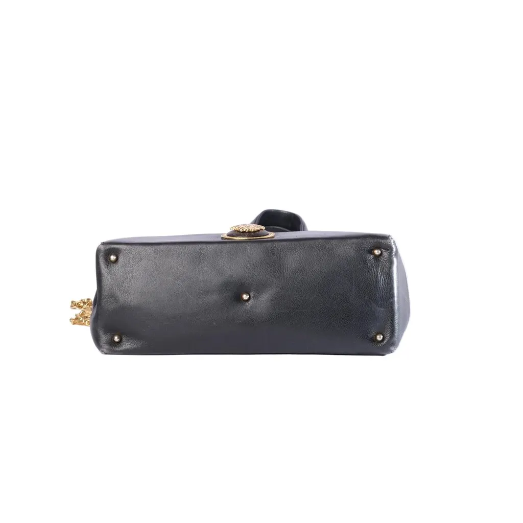 Gianni Versace Medusa Medallion Handbag- '80s Black Leather Good - Model View