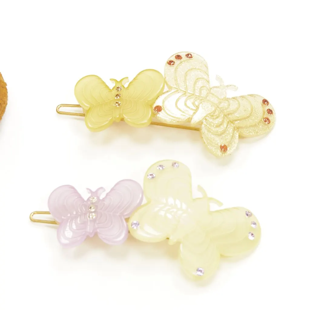 Unsigned Butterfly Hair Clips Yellow Plastic Never worn - Inside View