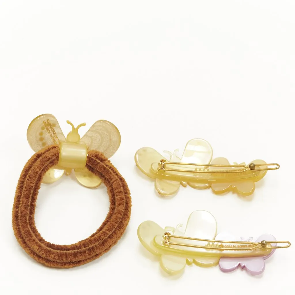 Unsigned Butterfly Hair Clips Yellow Plastic Never worn - Box View