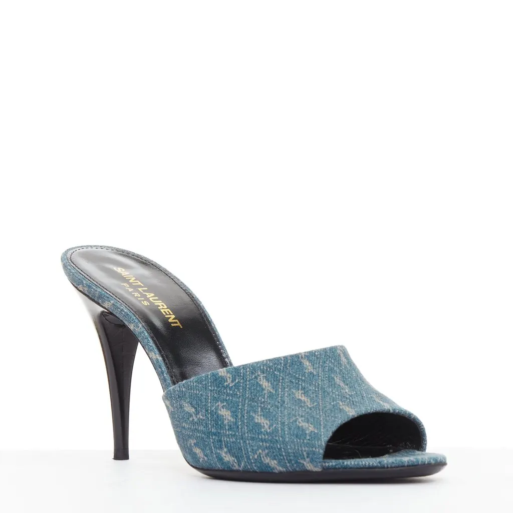 Saint Laurent Step into effortless Parisian chic with these YSL Cassandre mules, featuring all-over tonal YSL logo embroidery in washed denim and a sleek stiletto heel. Blue Denim Very good - Back View