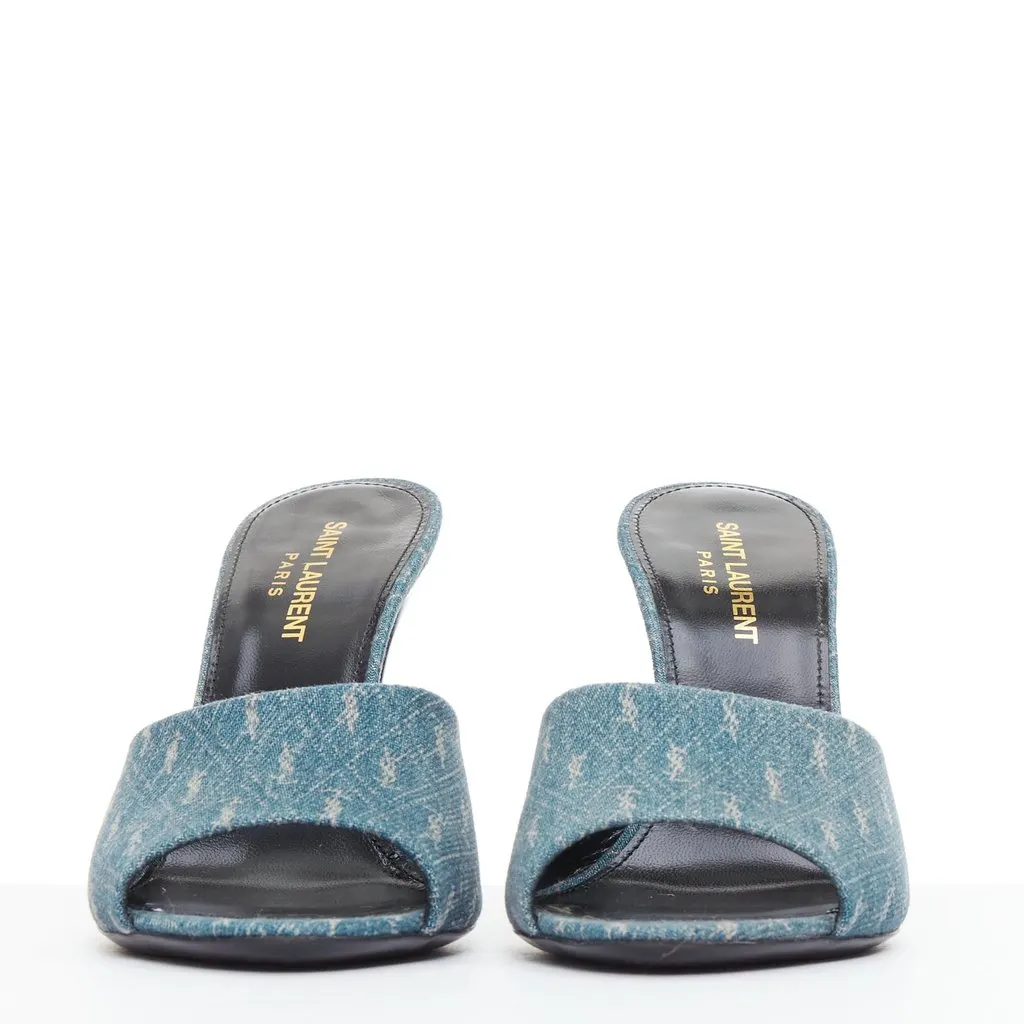 Saint Laurent Step into effortless Parisian chic with these YSL Cassandre mules, featuring all-over tonal YSL logo embroidery in washed denim and a sleek stiletto heel. Blue Denim Very good - Inside View
