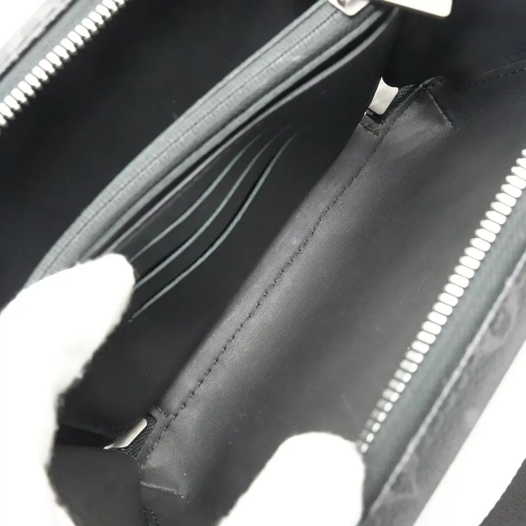 Louis Vuitton Horizon Clutch Monogram Eclipse Black Canvas Fair - Model View