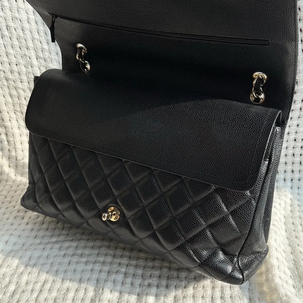 Chanel Classic Double Flap Maxi Black Quilted Caviar Leather Bag Black Leather Very good - Model View