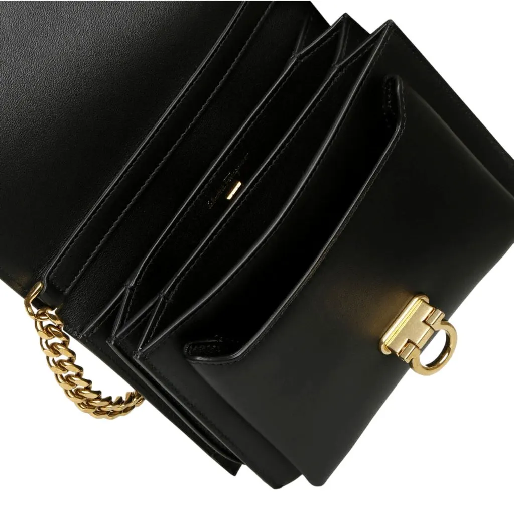 Salvatore Ferragamo Trifolio Black Leather Flap Crossbody Bag Gold Gancini Designer Black Leather Never worn - Model View