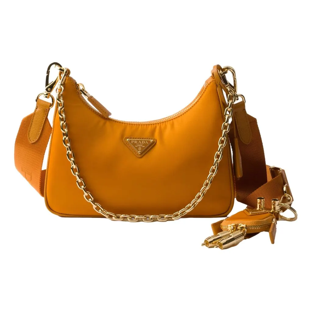 Prada Re-Edition 2005 Orange Re-Nylon and Saffiano Leather Shoulder Bag with Robot Charm Strap Orange Never worn - Front View