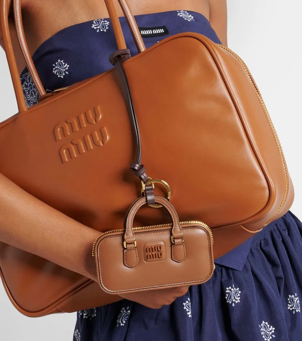 Miu Miu Arcadie Miniature Leather Bag Charm Brown Gold Hardware Zip Closure Brown Leather Never worn - Model View