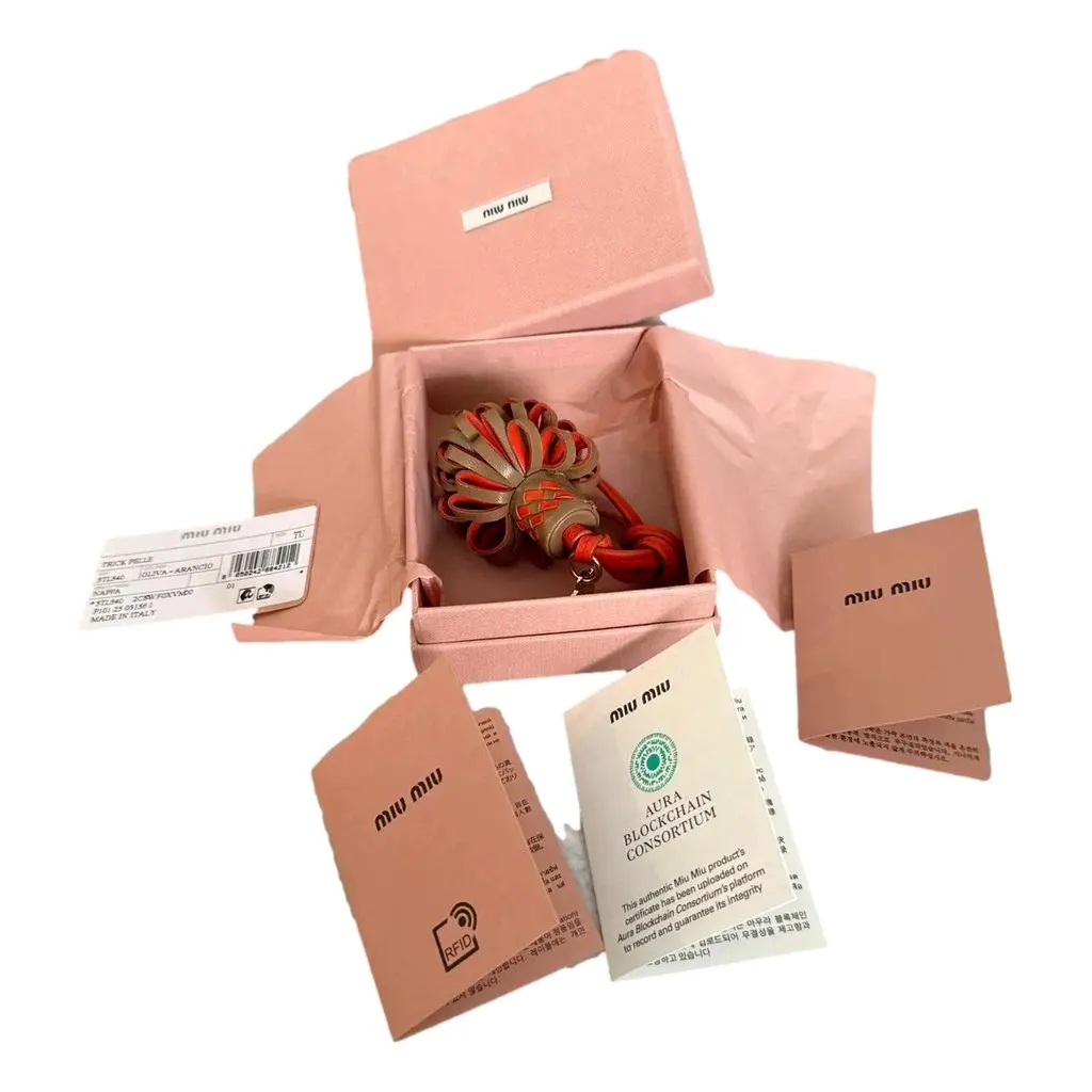 Miu Miu Trick Nappa Leather Pompom Bag Charm Brown and Orange Blue Leather Never worn - Box View