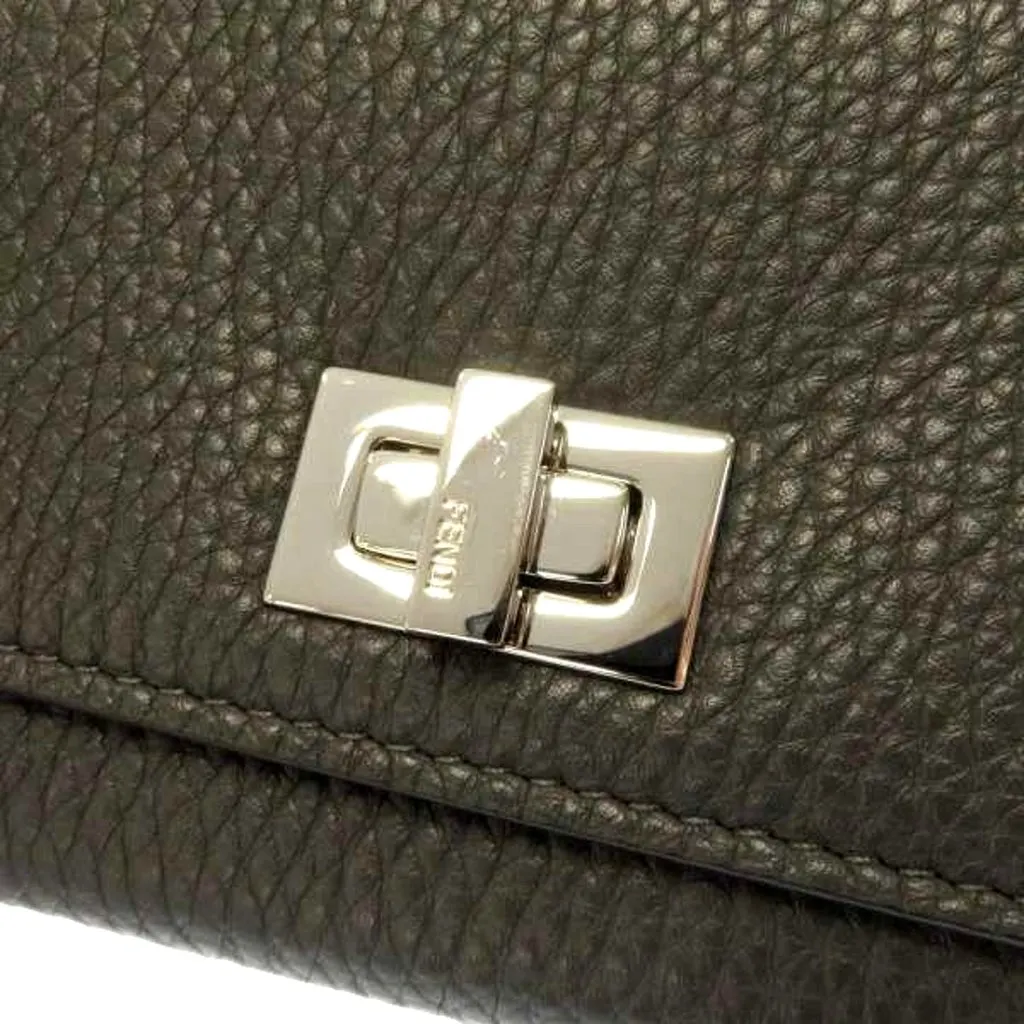 Fendi Peekaboo Turn Lock Black Grained Leather Continental Long Wallet Silver Hardware Green Leather Never worn - Inside View