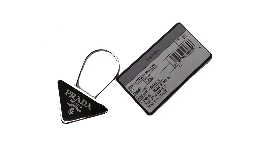Prada Black Enameled Metal Triangle Logo Keychain Charm Black Never worn - Model View