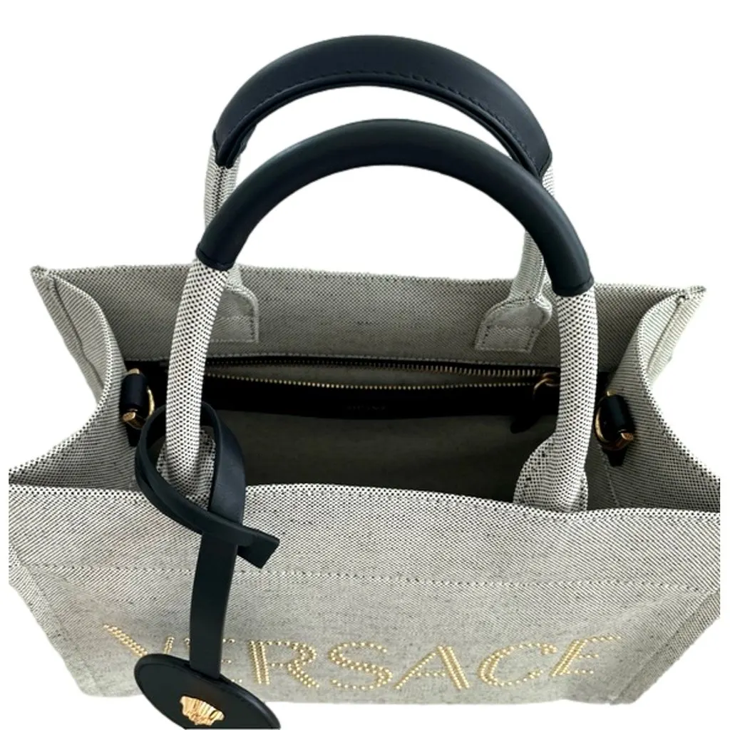 Versace Studded Logo Mini Tote Ecru Canvas Crossbody Bag Gold Hardware Silver Leather Never worn - Model View