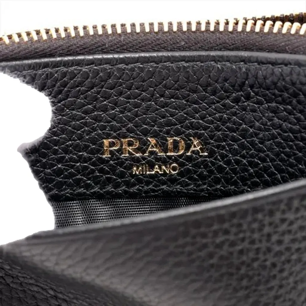 Prada Womens Vitello Grain Nero Black Leather Zip Top Card Wallet Black Leather Never worn - Model View