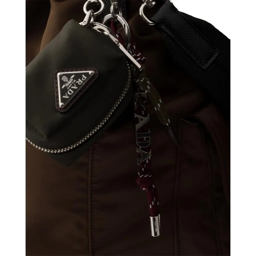 Prada Olive Green Re-Nylon Mini Pouch Trick Bag Charm Green Polyamide Never worn - Model View