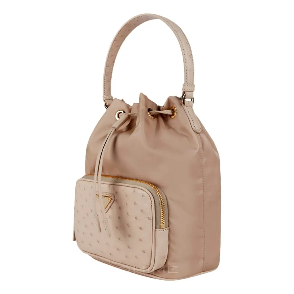 Prada Duet Tessuto Nylon and Ostrich Leather Bucket Bag in Cammeo Beige Brown Leather Never worn - Model View