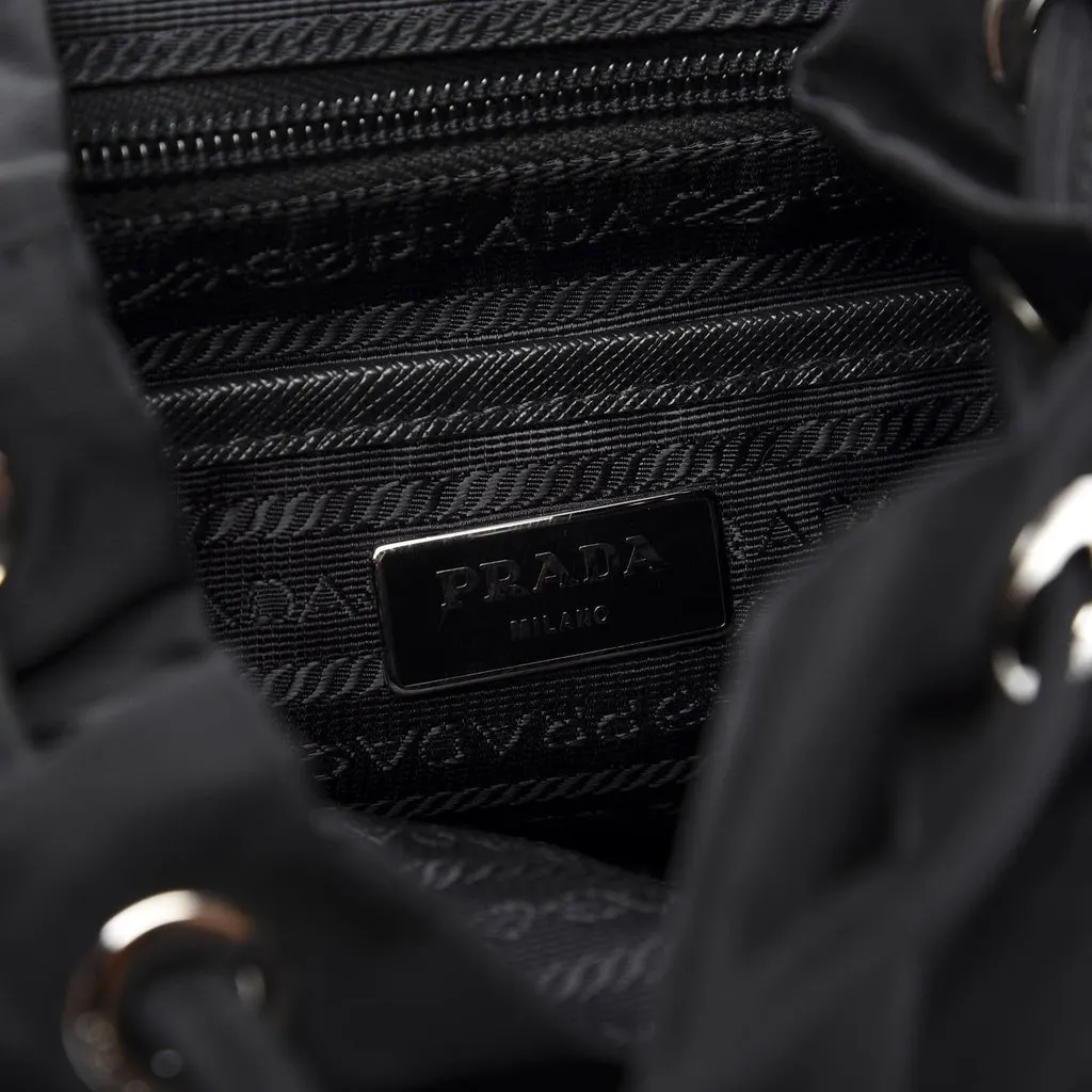 Prada Re-Nylon and Saffiano Leather Trim Medium Drawstring Rucksack Backpack in Black Black Leather Never worn - Box View