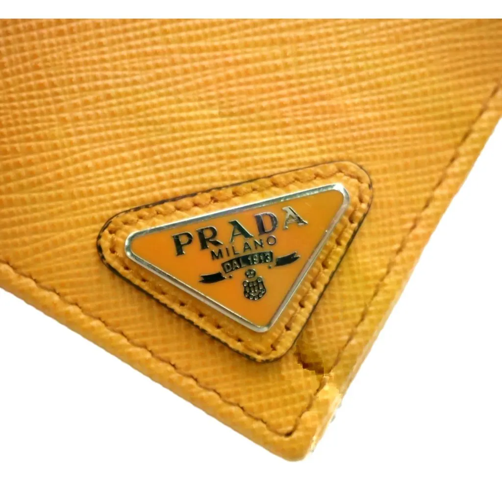 Prada Saffiano Leather Bifold Wallet with Coin Pocket Amber Orange Orange Leather Never worn - Model View