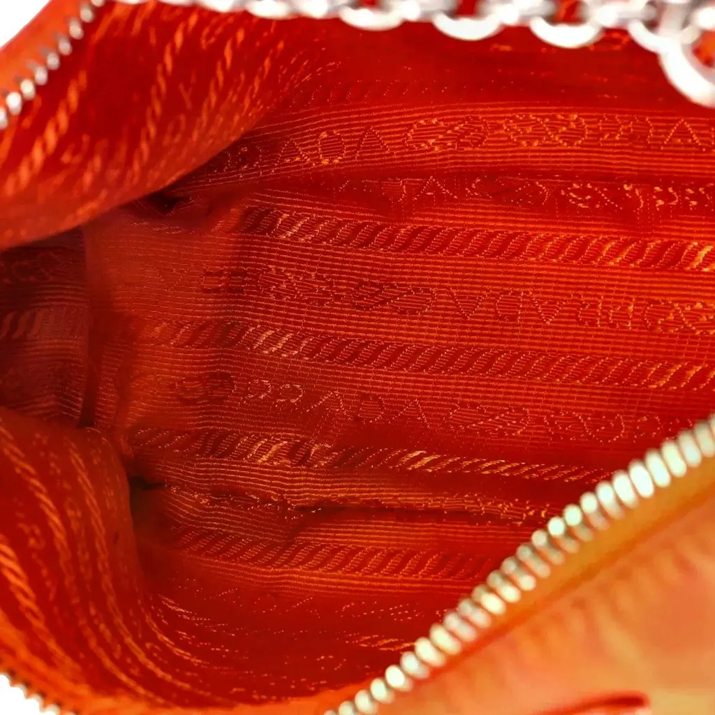 Prada Re-Edition 2005 Arancio Orange Nylon Saffiano Leather Shoulder Bag Orange Polyamide Never worn - Model View