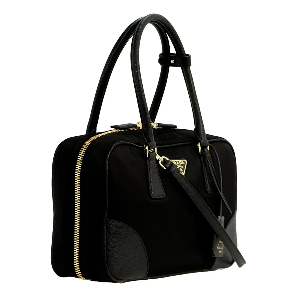 Prada Prada Re-Edition 1978 Medium Re-Nylon and Saffiano Leather Two-Handle Bag Black Black Leather Never worn - Model View