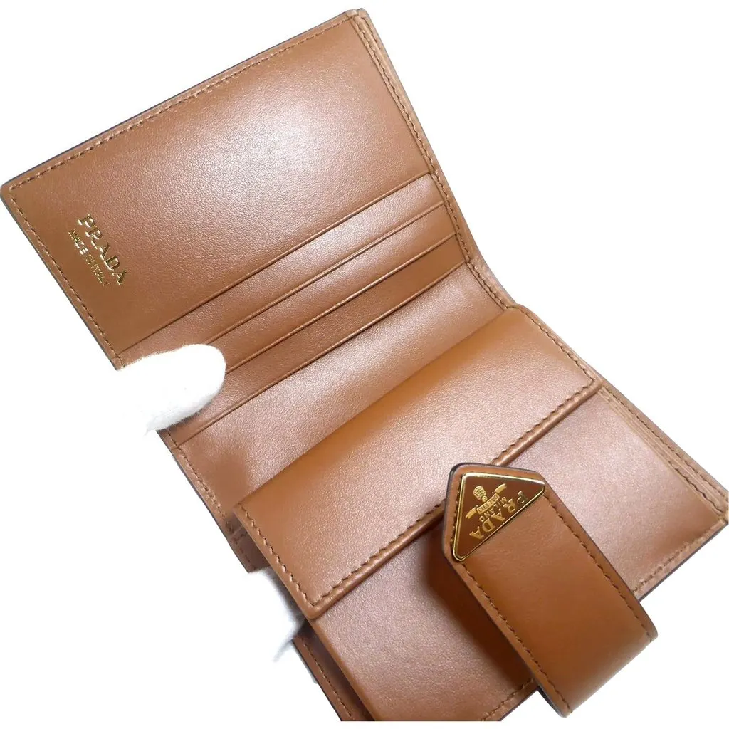 Prada City Calf Leather Snap Bifold Wallet Cognac Brown Brown Leather Never worn - Model View