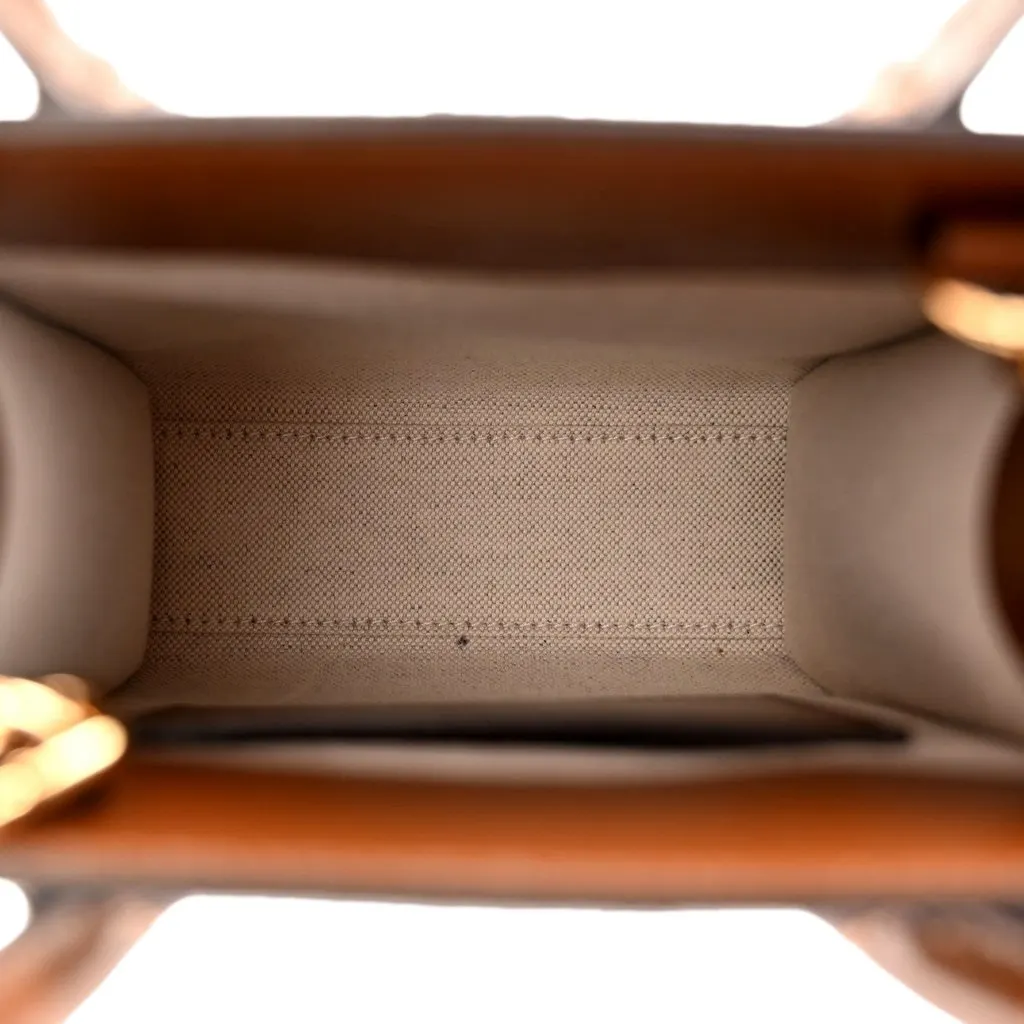 Gucci Interlocking G Leather Emblem Supreme Canvas Brown Leather Mini Shopper Tote Brown Leather Never worn - Model View