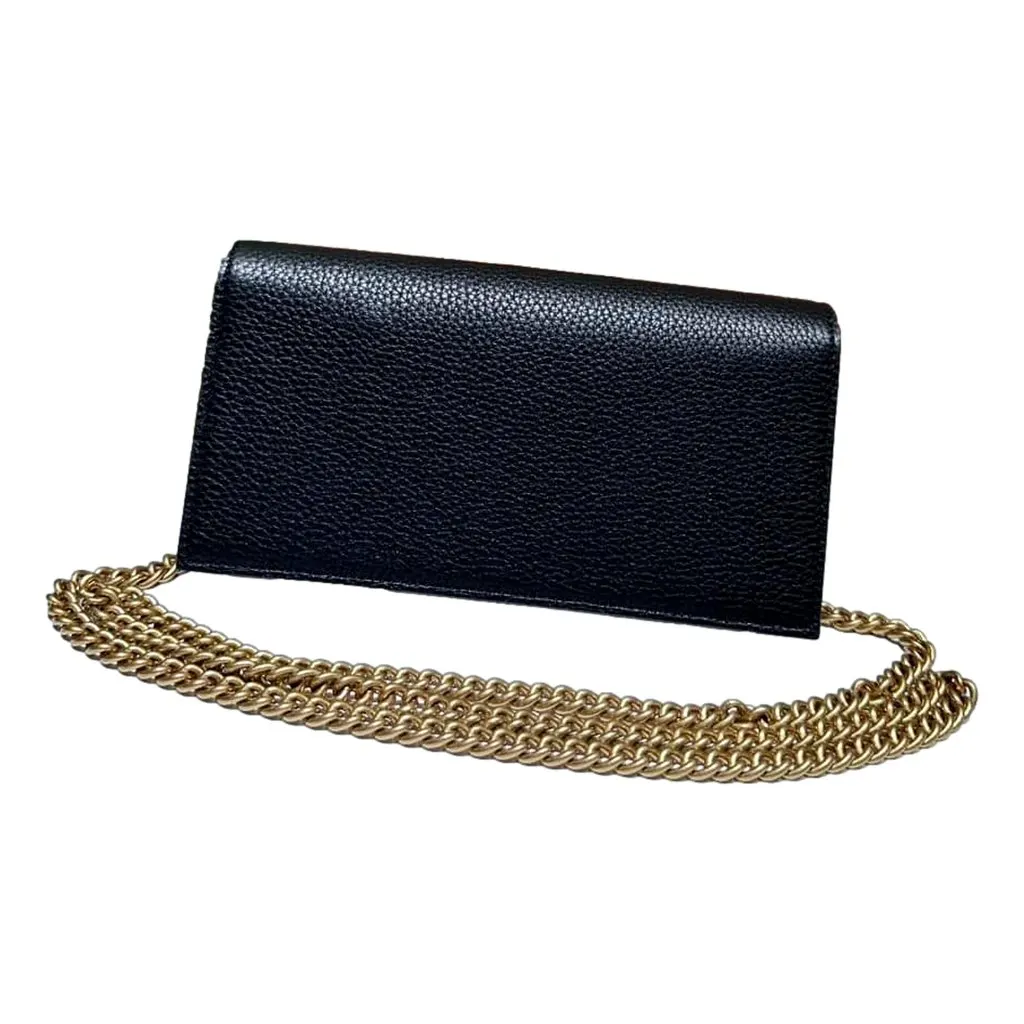 Gucci Interlocking GG Black Python Leather Bow Wallet on Chain Gold Hardware Black Leather Never worn - Model View