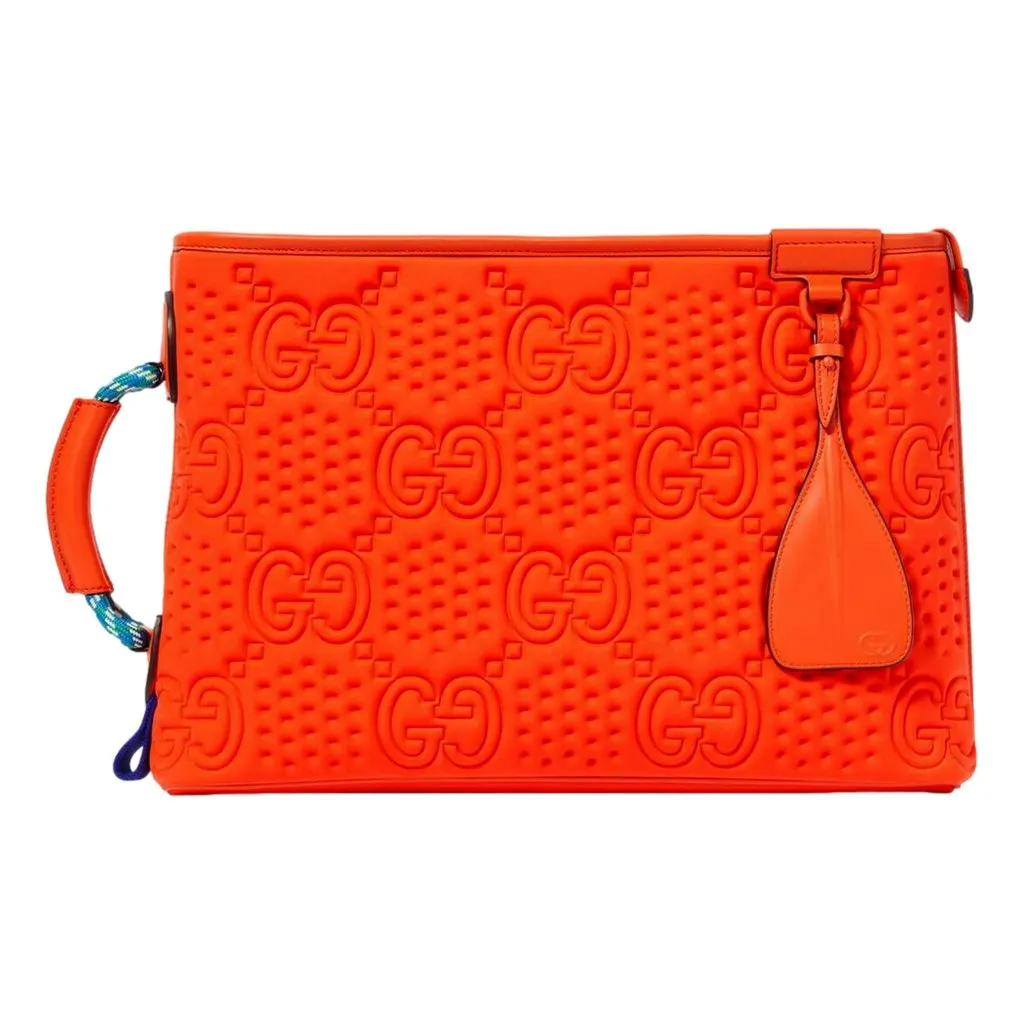 Gucci Off The Grid GG Embossed Orange Rubber Pouch Clutch Bag Orange Leather Never worn - Front View