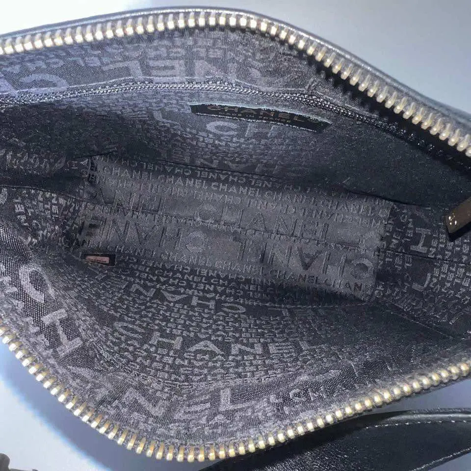Chanel Chocolate Bar Black Leather Good - Model View