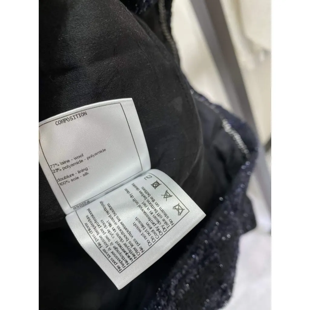 Chanel La Petite Veste Noire Black Wool Jacket Black Wool Very good - Model View