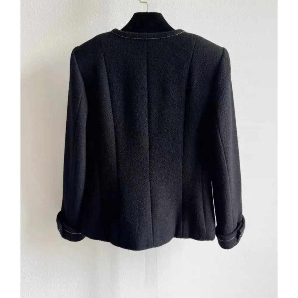 Chanel La Petite Veste Noire Black Wool Jacket Black Wool Very good - Model View