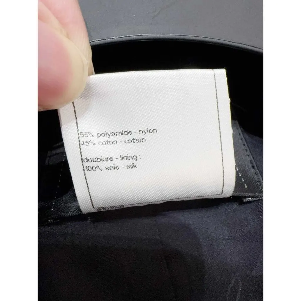Chanel La Petite Veste Noire Black Polyamide Jacket Black Polyamide Very good - Model View