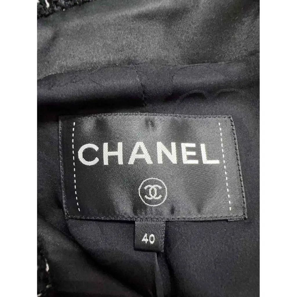 Chanel La Petite Veste Noire Black Tweed Jacket Black Tweed Very good - Model View
