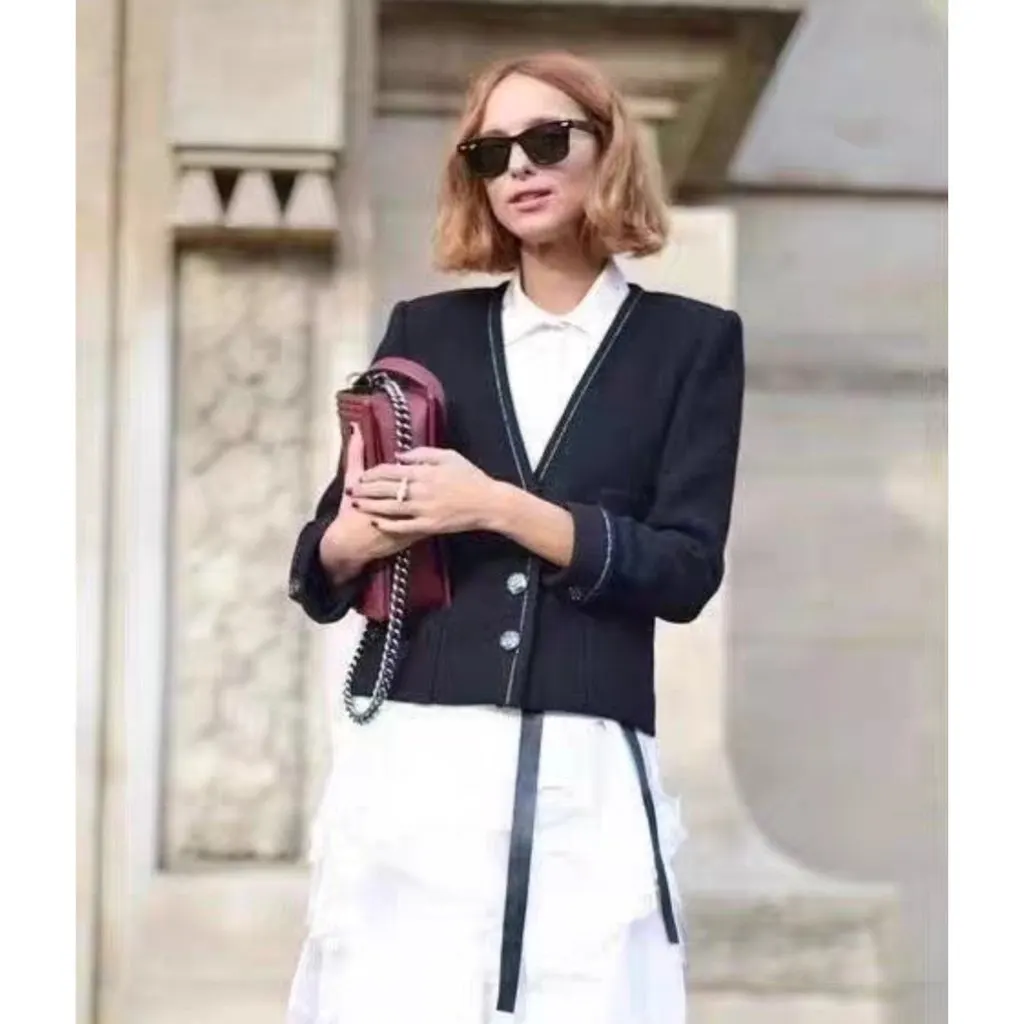 Chanel La Petite Veste Noire Black Wool Jacket Black Wool Very good - Model View