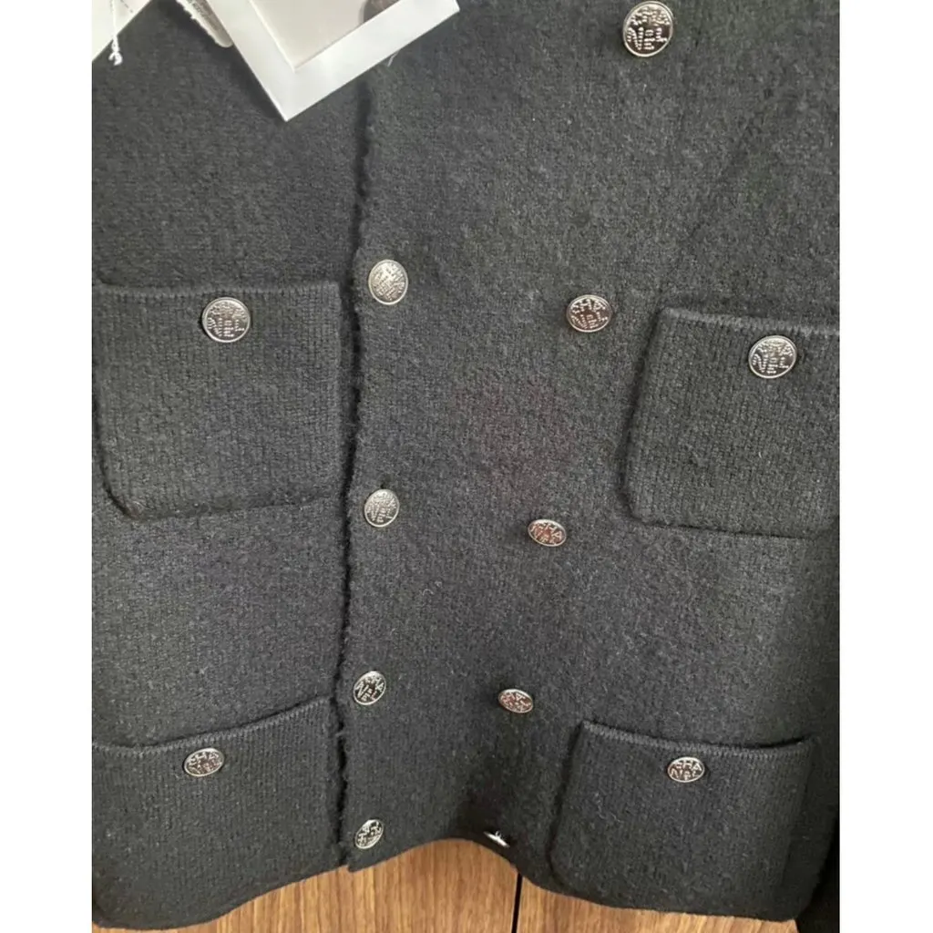 Chanel La Petite Veste Noire Black Cashmere Jacket Black Cashmere Never worn, with tag - Model View