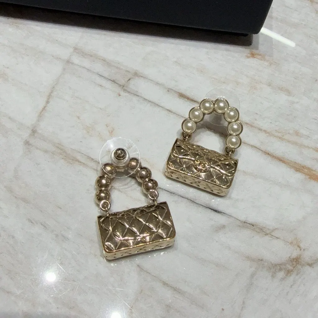 Chanel Gold Plated Earrings Gold Very good - Model View