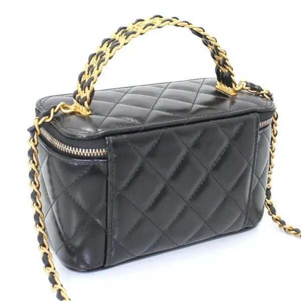 Chanel Black Matlasse Coco Lambskin Leather Vanity Bag Black Leather Never worn - Model View