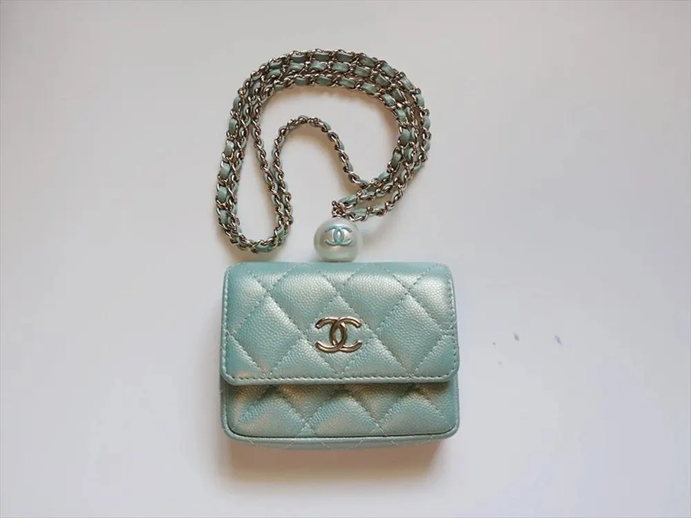 Chanel Iridescent Light Blue Caviar Quilted Pearl On Top Wallet On Chain Coin Purse Blue Leather Very good - Model View