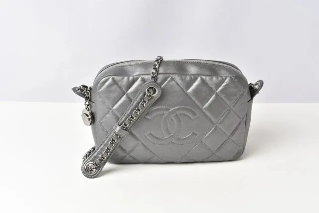 Chanel Metallic Silver Lambskin Quilted Diamond CC Camera Bag Silver Leather Very good - Model View