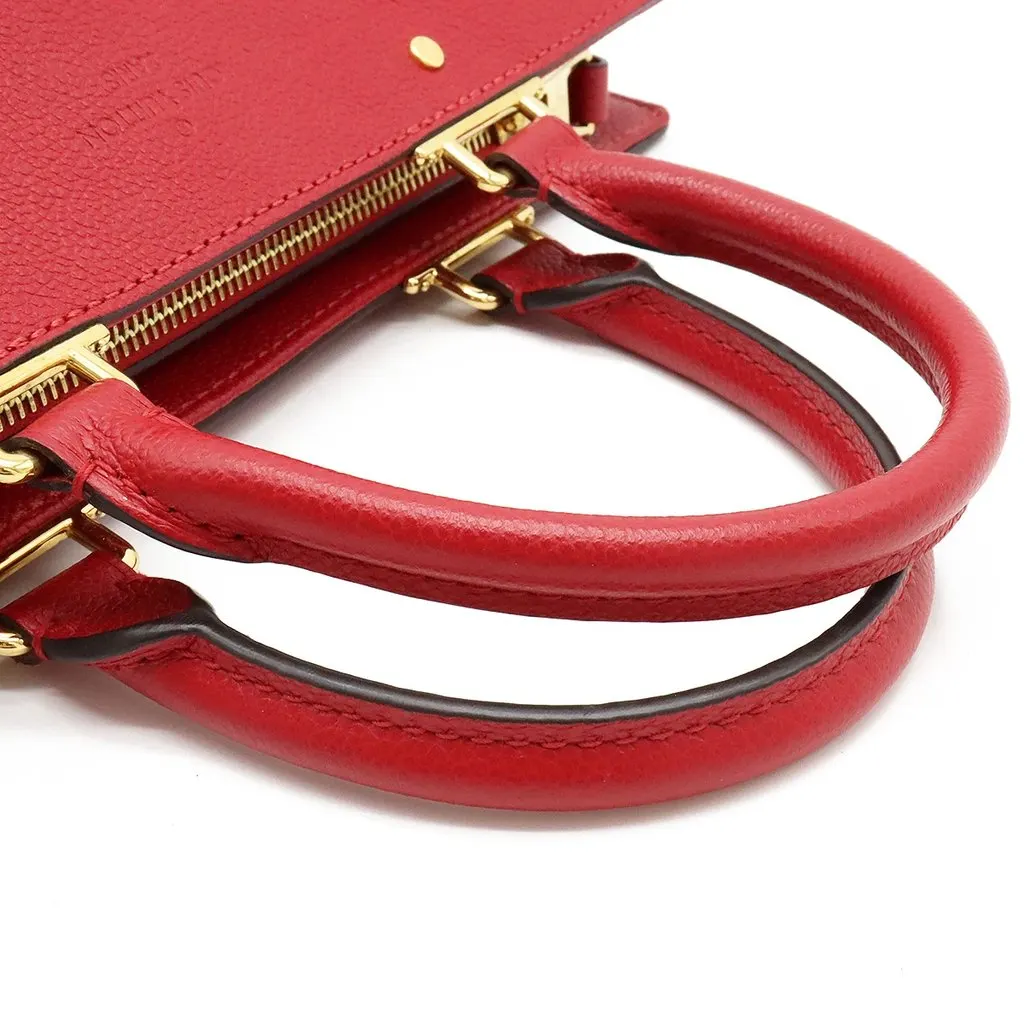 Louis Vuitton Monogram Empreinte Sully PM Shoulder Bag Red Leather Never worn - Model View
