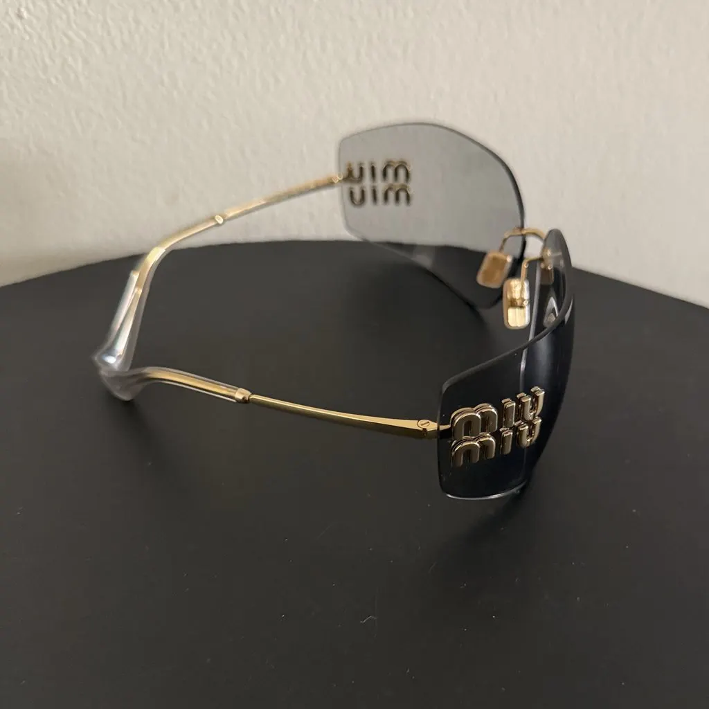 Miu Miu New Collection MiuMiu Unworn Shades Gold Stainless steel Never worn - Model View