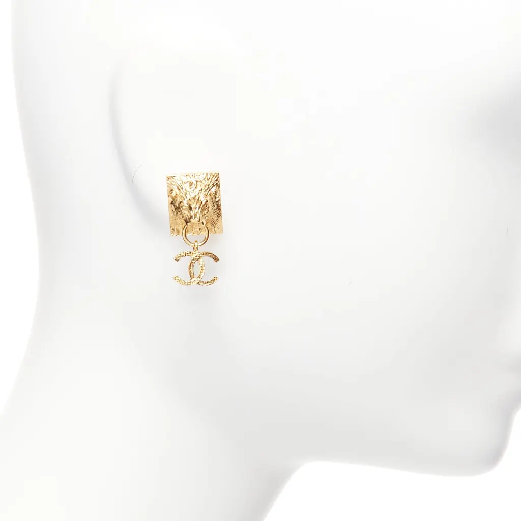 Chanel Lion Head Earrings Gold Metal Never worn - Model View
