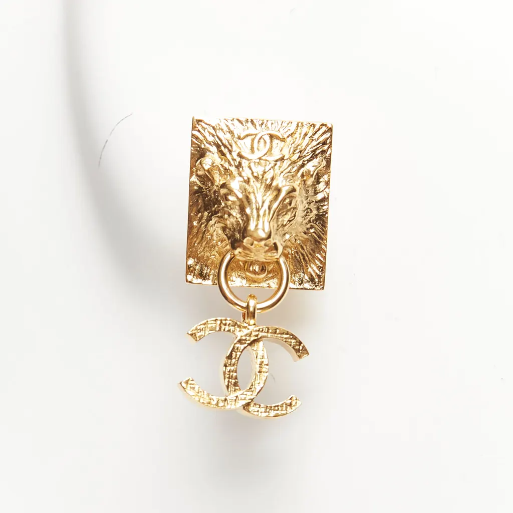 Chanel Lion Head Earrings Gold Metal Never worn - Box View