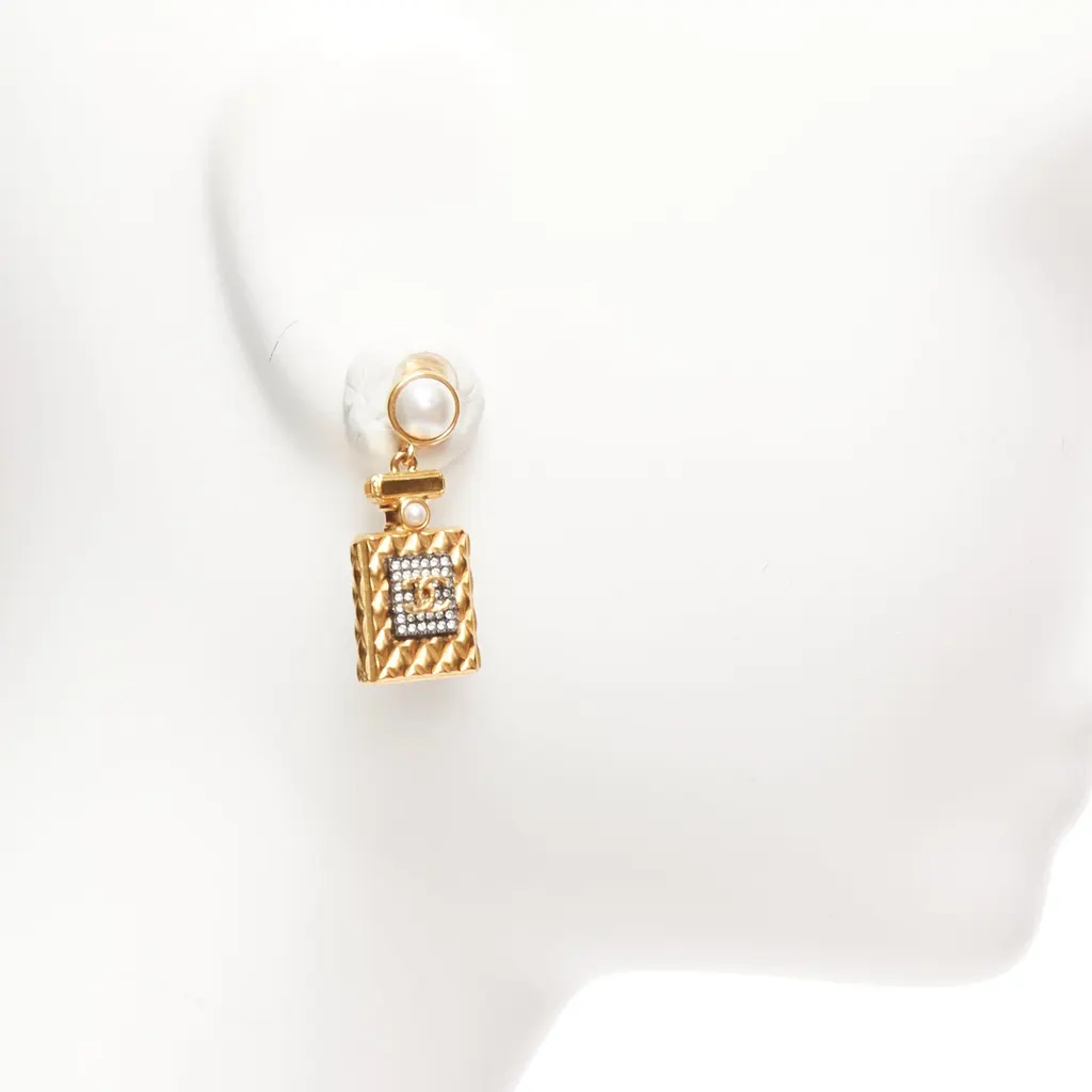 Chanel Perfume Bottle Earrings Gold Metal Never worn - Model View